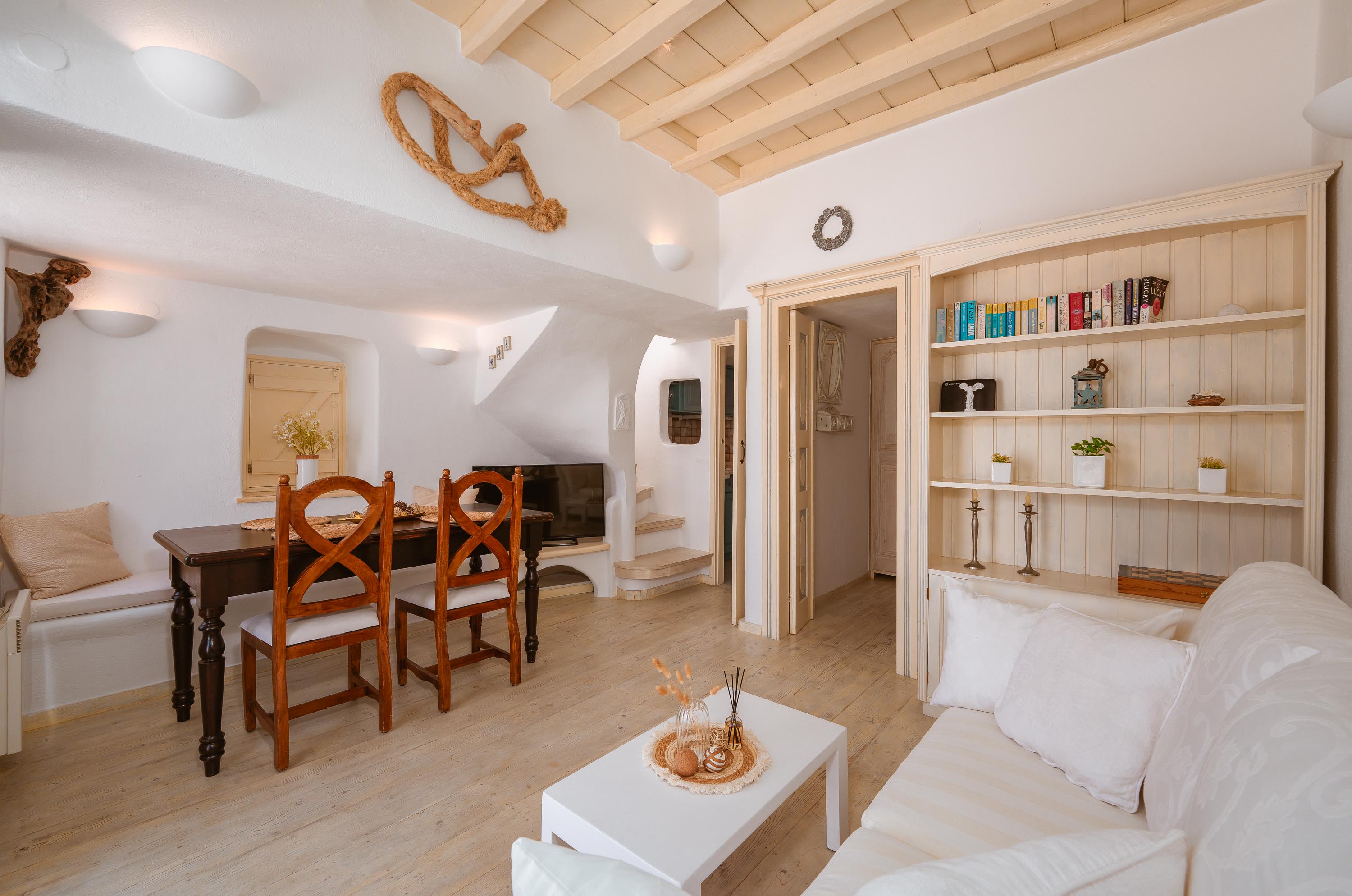Living room with sea view at sunset